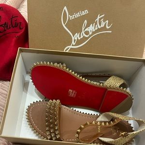 Christian Louboutin Cordorella Spike
Flat Red Sole Sandals